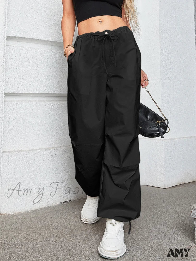 Women's Jodhpurs with Rounded HemAmy Fashion - Oversized Drawstring Low Waist Slant Pocket Cargo Parachute Pants